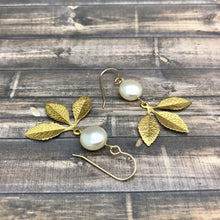 Load image into Gallery viewer, Handmade Swarovski Coin Pearl Earrings with Leaf Charm
