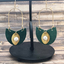 Load image into Gallery viewer, Brass Leaf and Pearl Charm hanging from metallic leather and all attached to a gold plated hoop earrings
